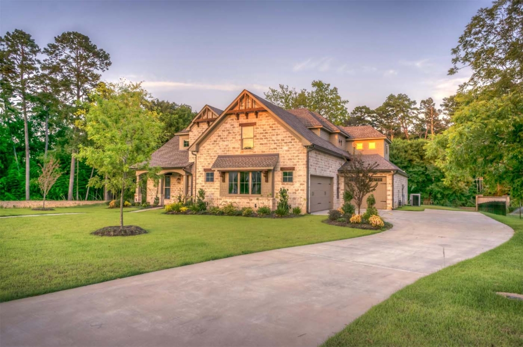 Texas Home with long driveway with trees